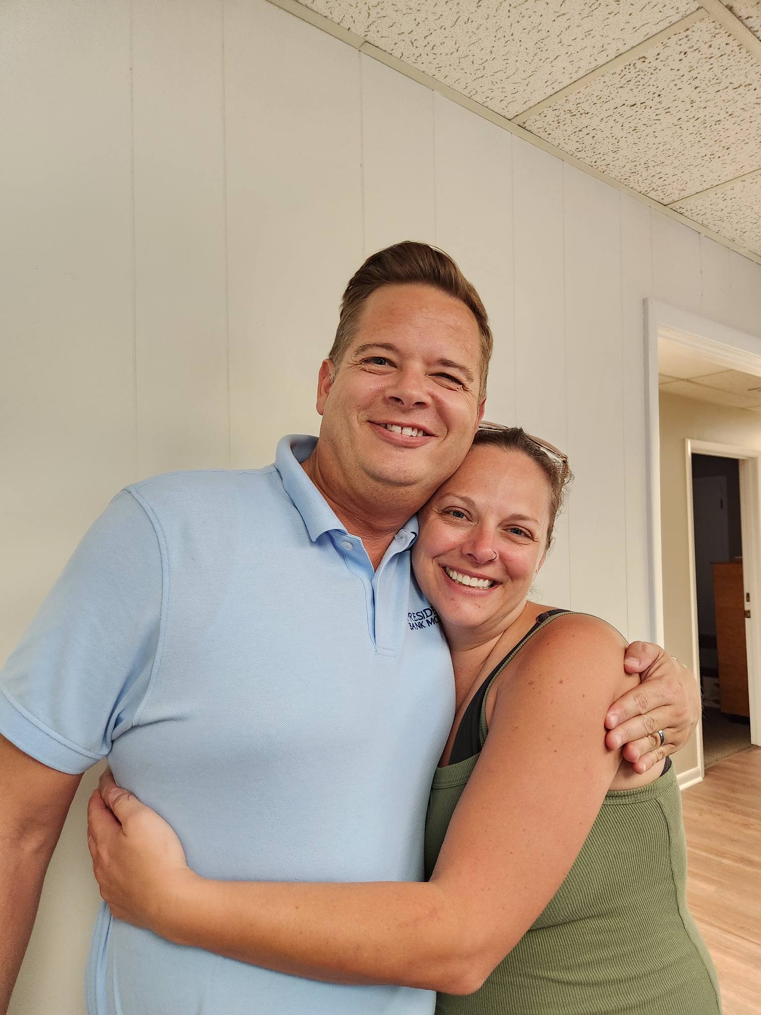 Satisfied client at closing table in Camden County, Georgia