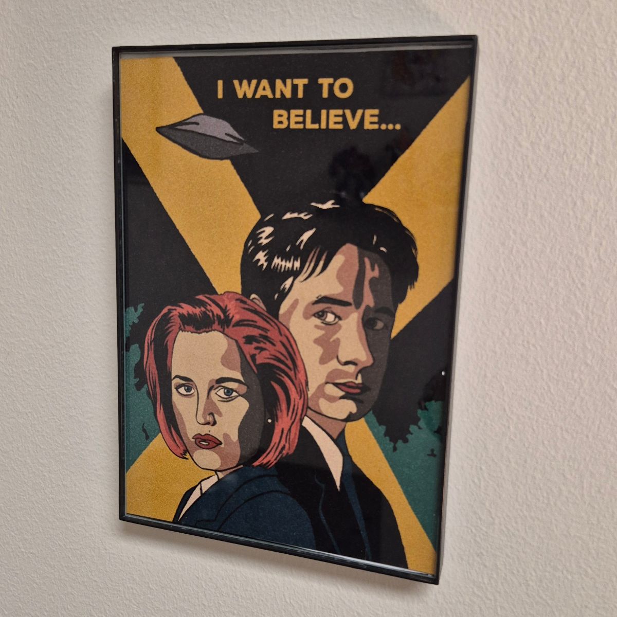 The X-Files The Truth is Out There print in Mitch's office